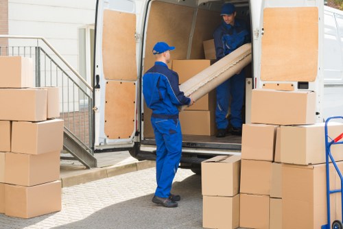 Packed boxes and furniture prepared for small removals service